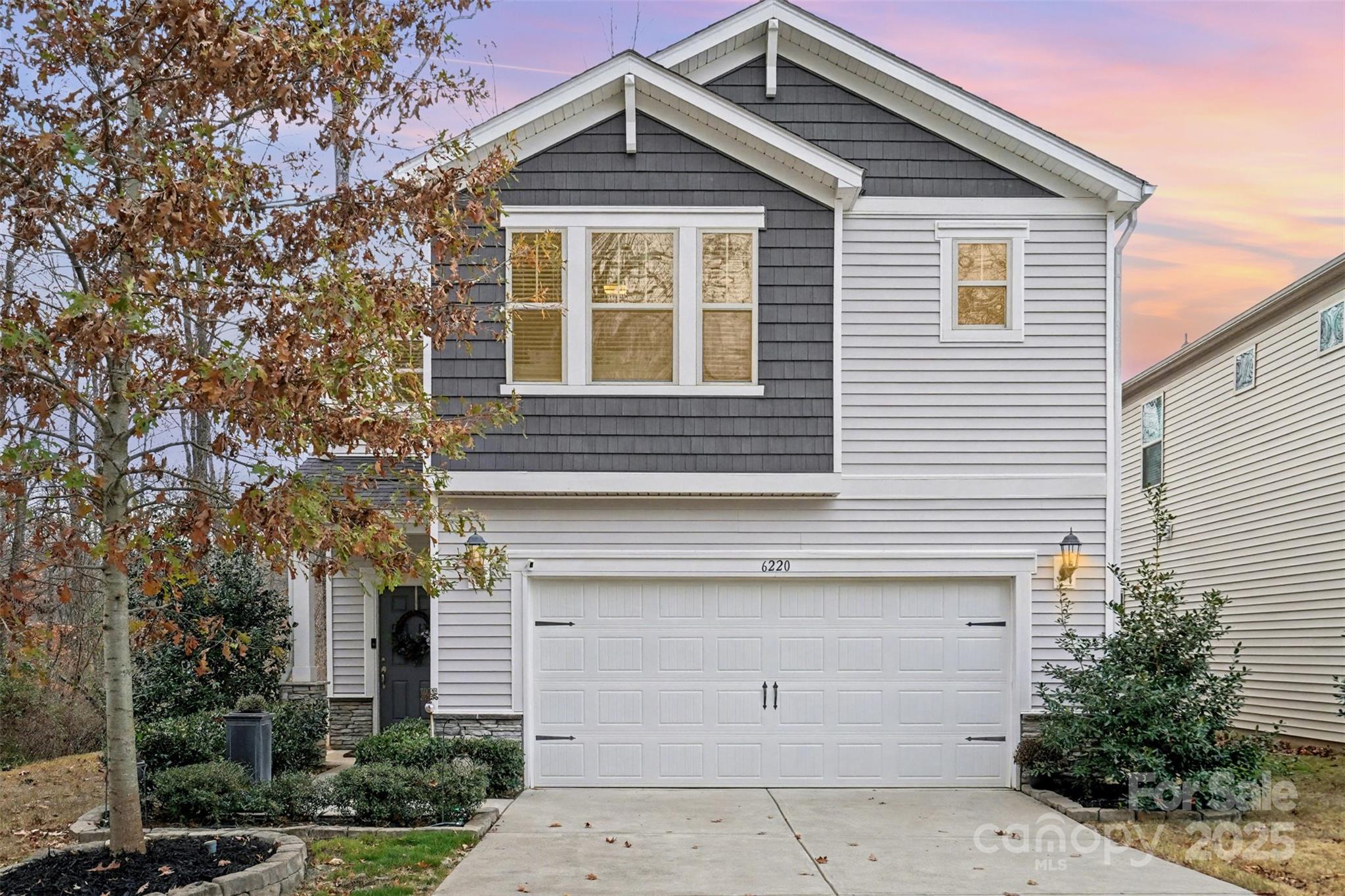 6220 Hailstone Road Charlotte, NC 28215 - Photo 36 of 37 a view of house with tree s