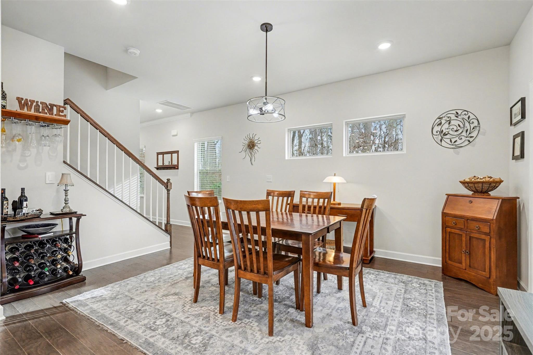 6220 Hailstone Road Charlotte, NC 28215 - Photo 5 of 37 a view of a dining room with furniture