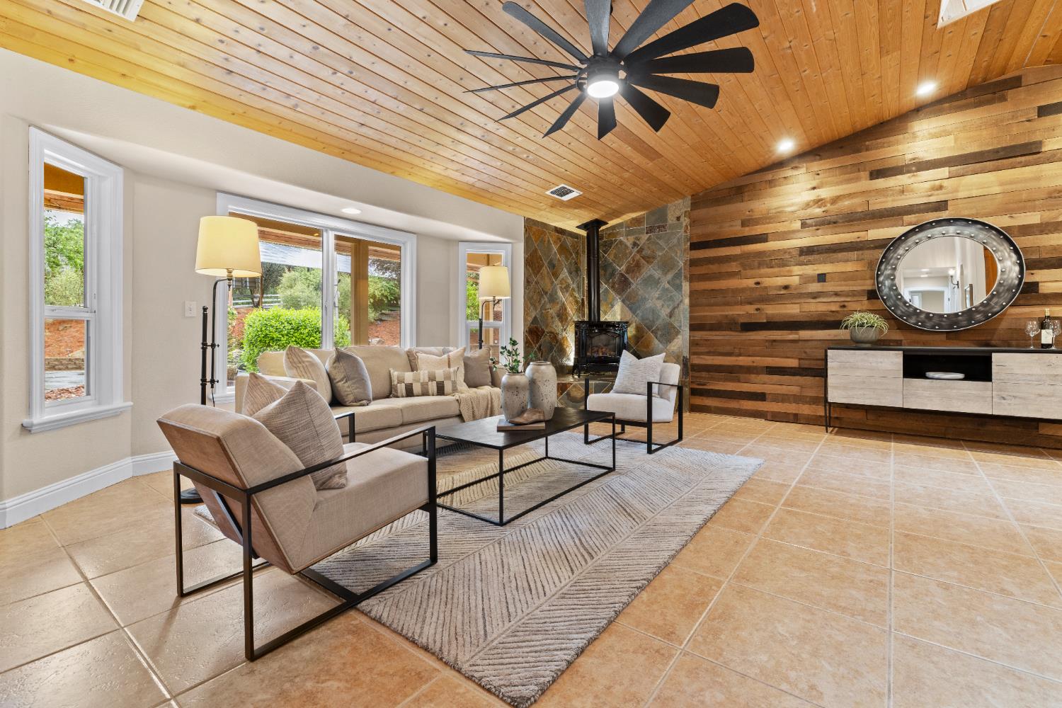 7396 Callison Road Penryn, CA 95663 - Photo 14 of 99 Family room with a secret door for storage or to hide electronics behind the wood wall.