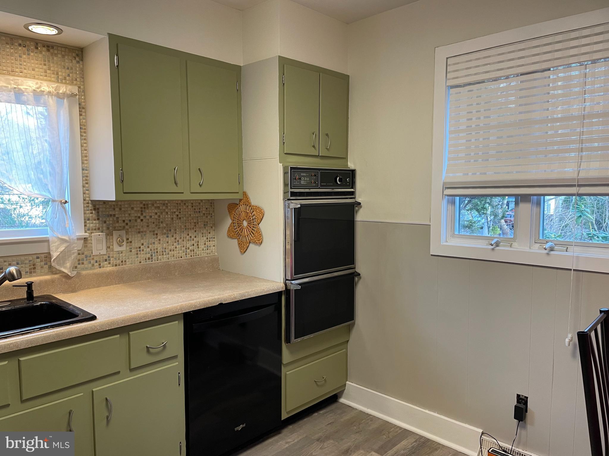 2400 Edge Hill Road Willow Grove, PA 19090 - Photo 23 of 43 a kitchen with a refrigerator and a sink
