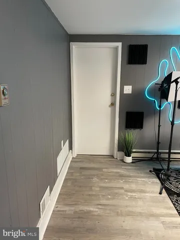 a view of a livingroom with a flat screen tv