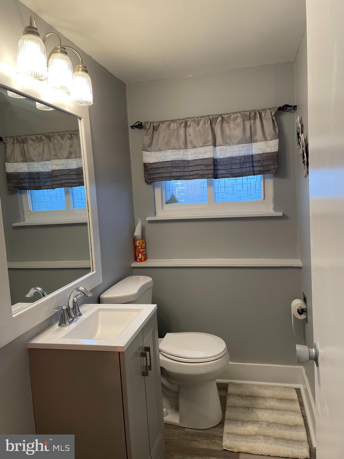 2400 Edge Hill Road Willow Grove, PA 19090 - Photo 30 of 43 a bathroom with a sink a toilet and mirror