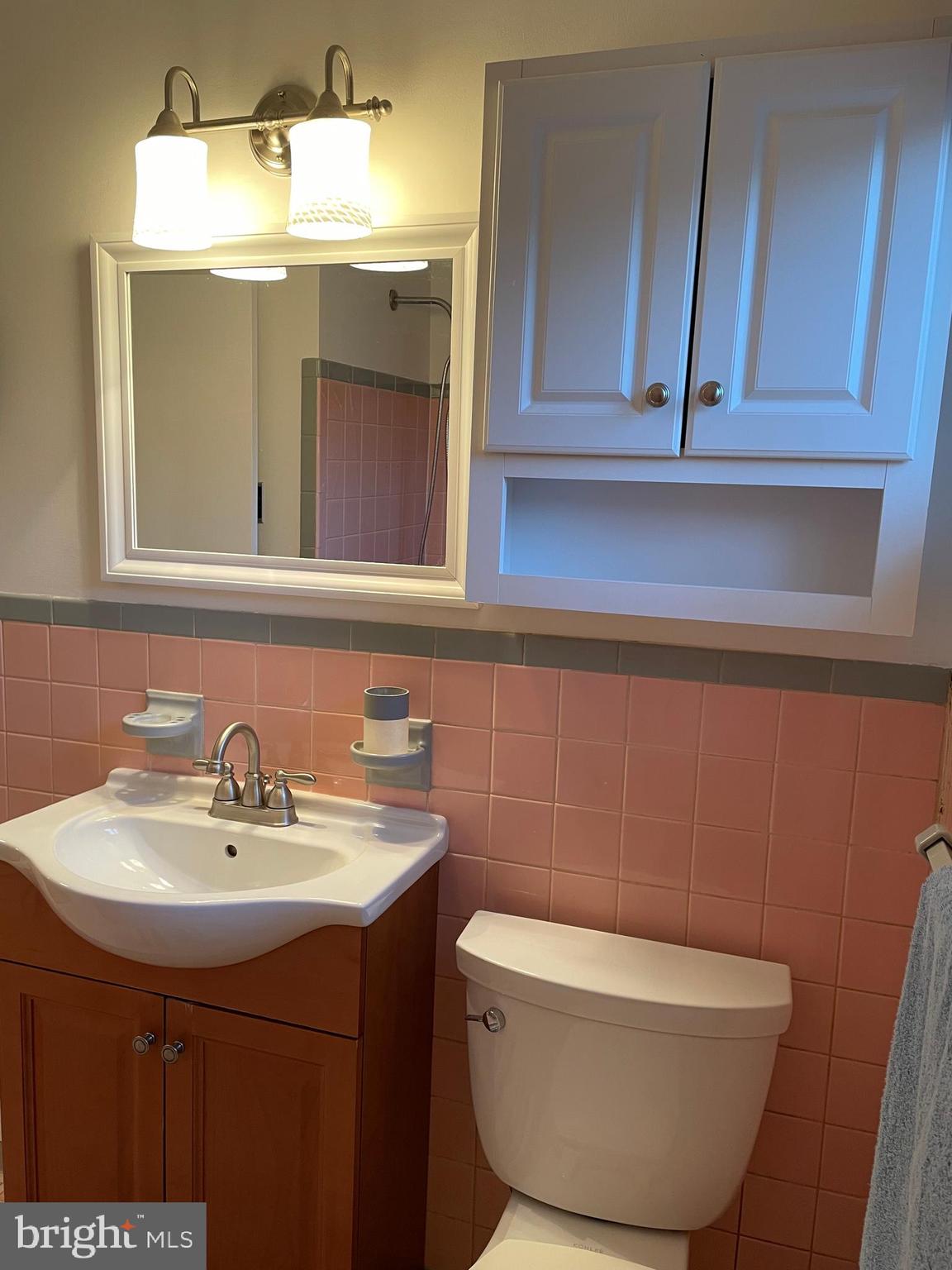 2400 Edge Hill Road Willow Grove, PA 19090 - Photo 39 of 43 a bathroom with a sink and a mirror