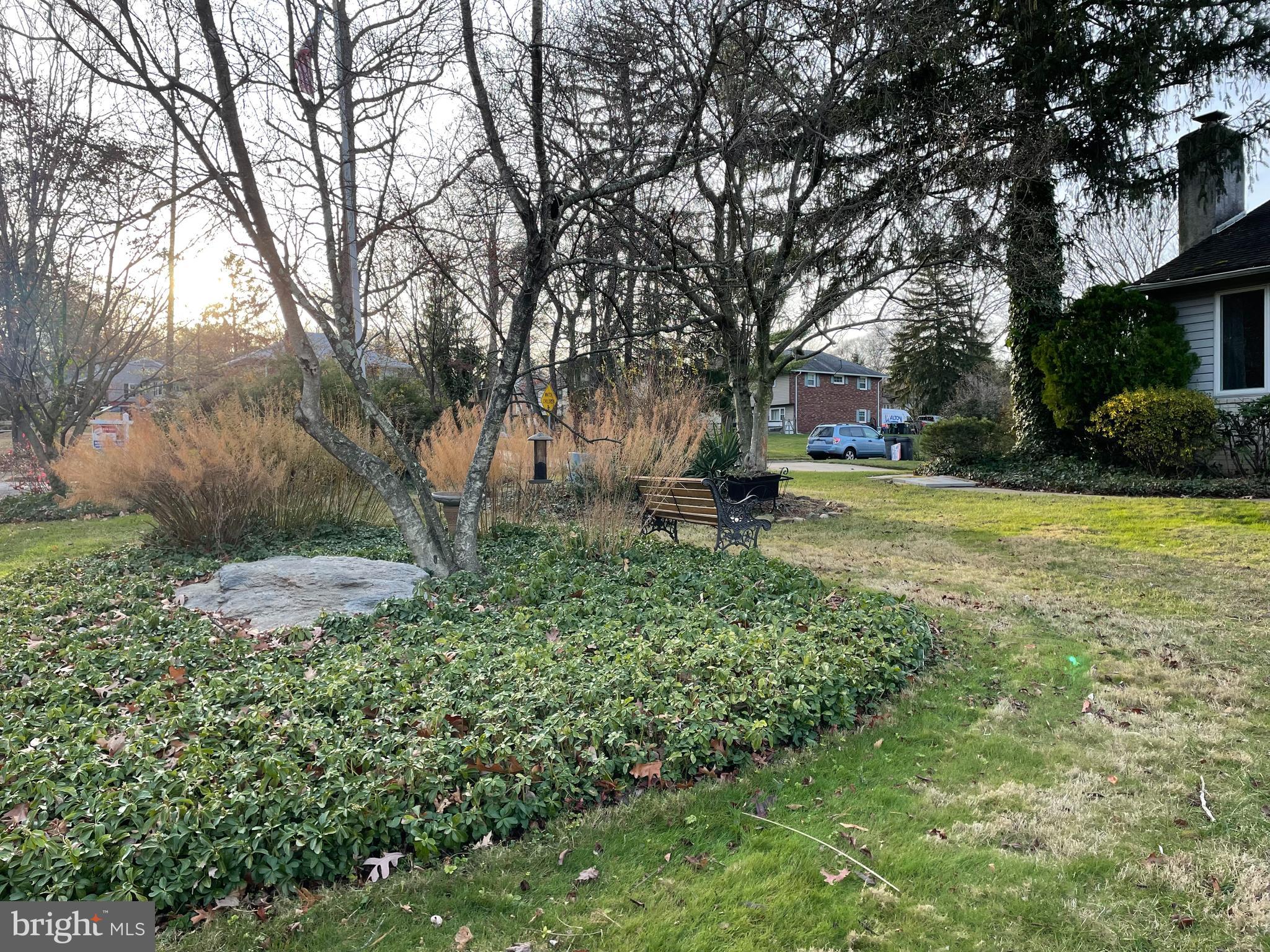 2400 Edge Hill Road Willow Grove, PA 19090 - Photo 6 of 43 a view of a garden with trees