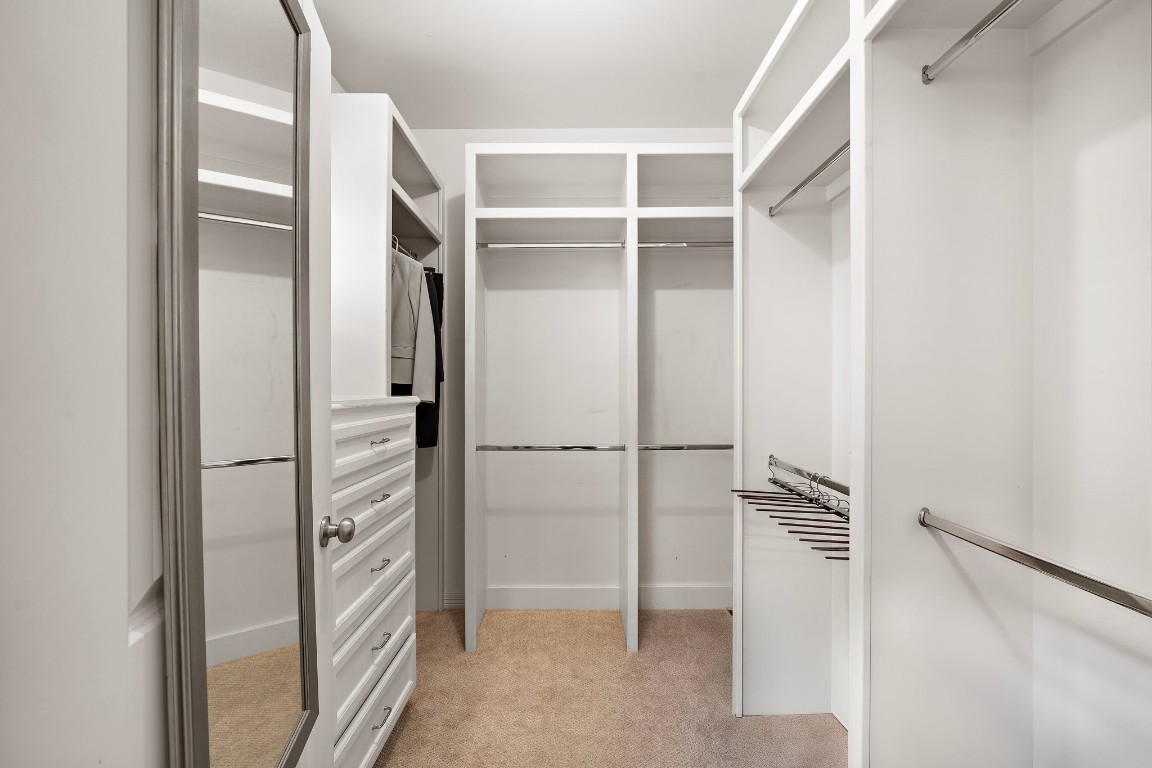 3929 Floyd Street Houston, TX 77007 - Photo 24 of 42 a view of walk in closet with empty racks