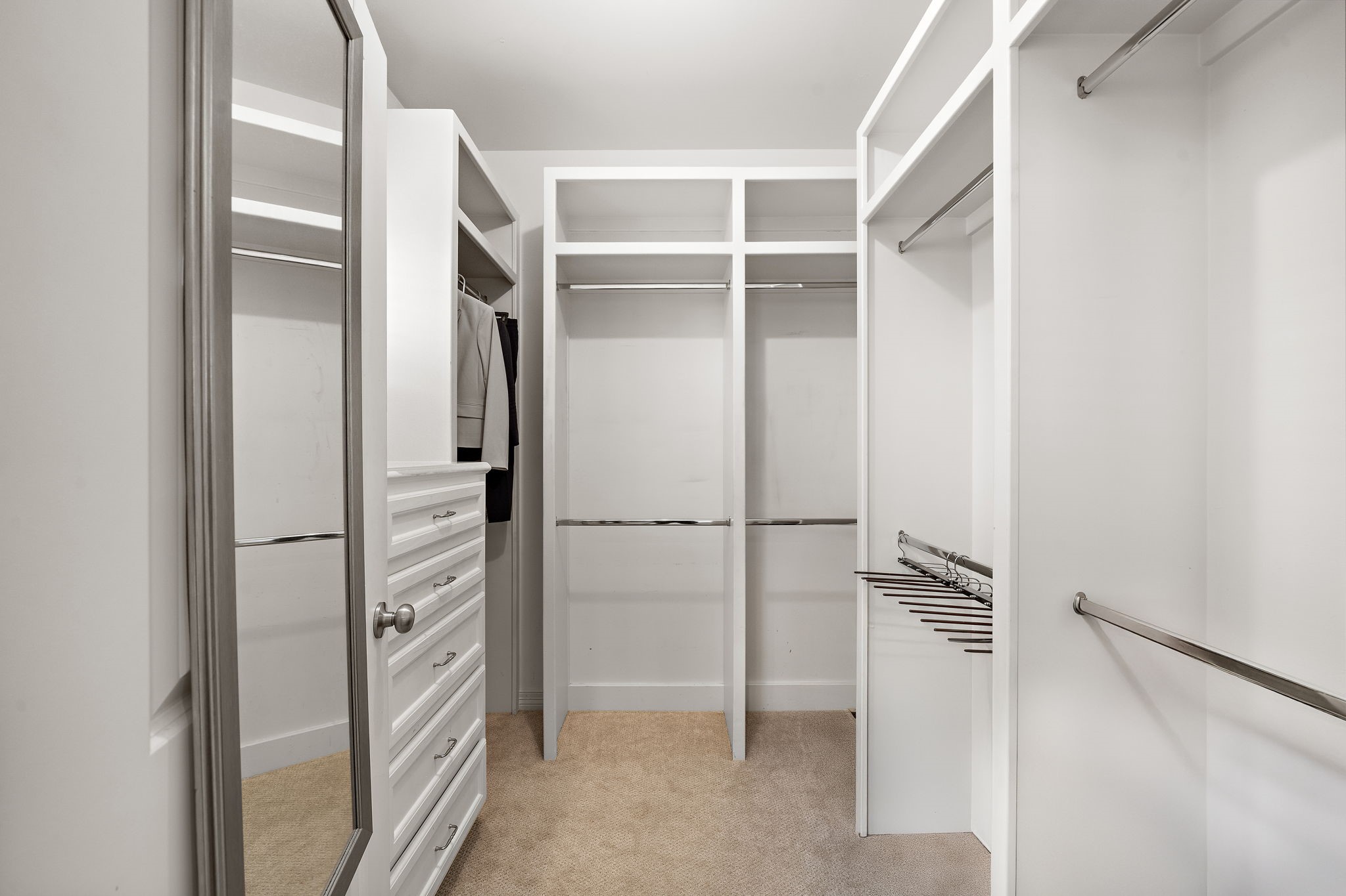 3929 Floyd Street Houston, TX 77007 - Photo 24 of 42 a view of walk in closet with empty racks