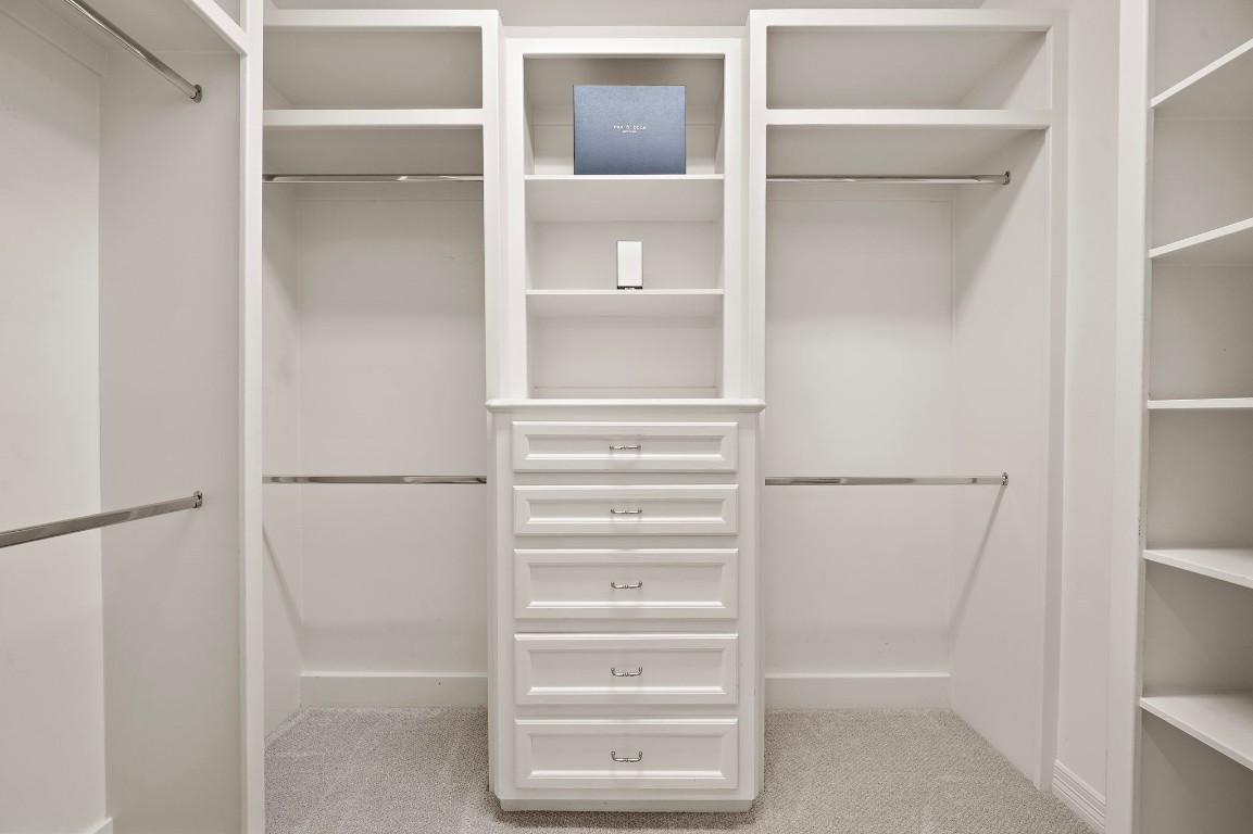 3929 Floyd Street Houston, TX 77007 - Photo 28 of 42 a view of walk in closet with empty racks