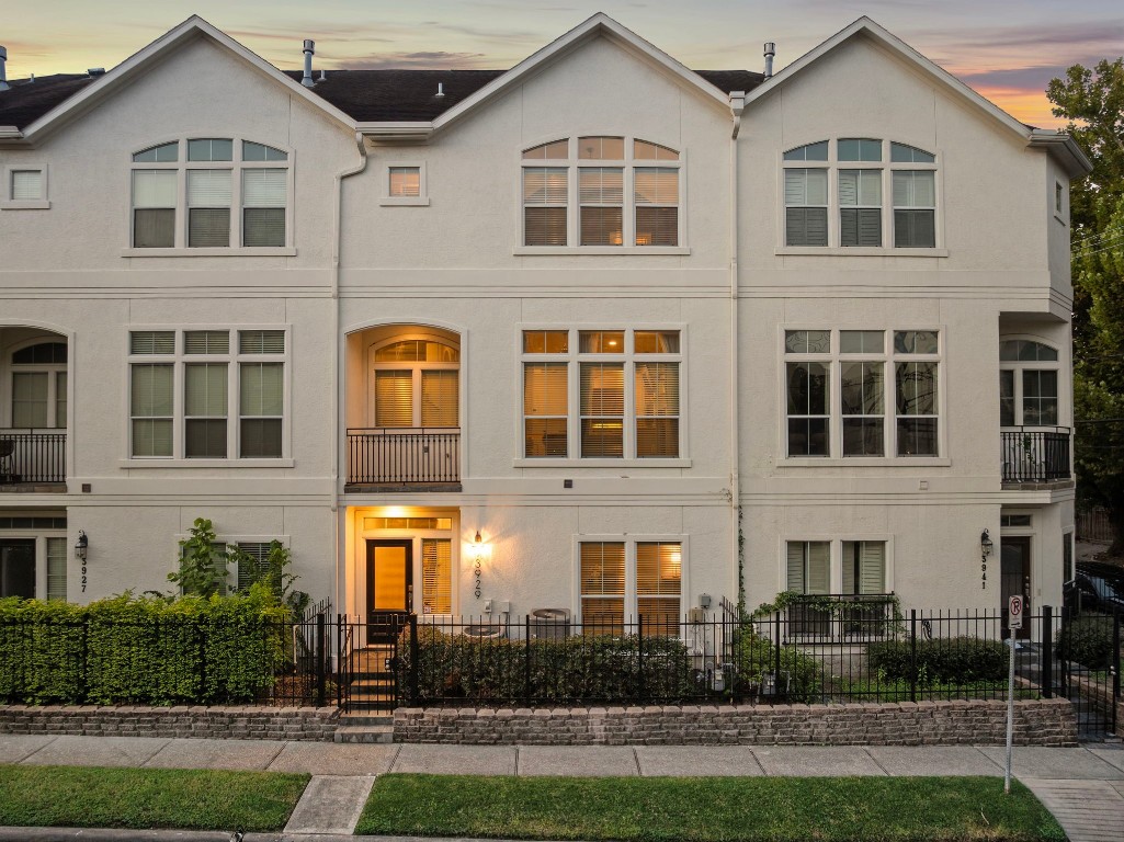 3929 Floyd Street Houston, TX 77007 - Photo 6 of 42 The private gated entry and low-maintenance landscaping set the tone for sophisticated living in a prime, commuter-friendly Houston location.