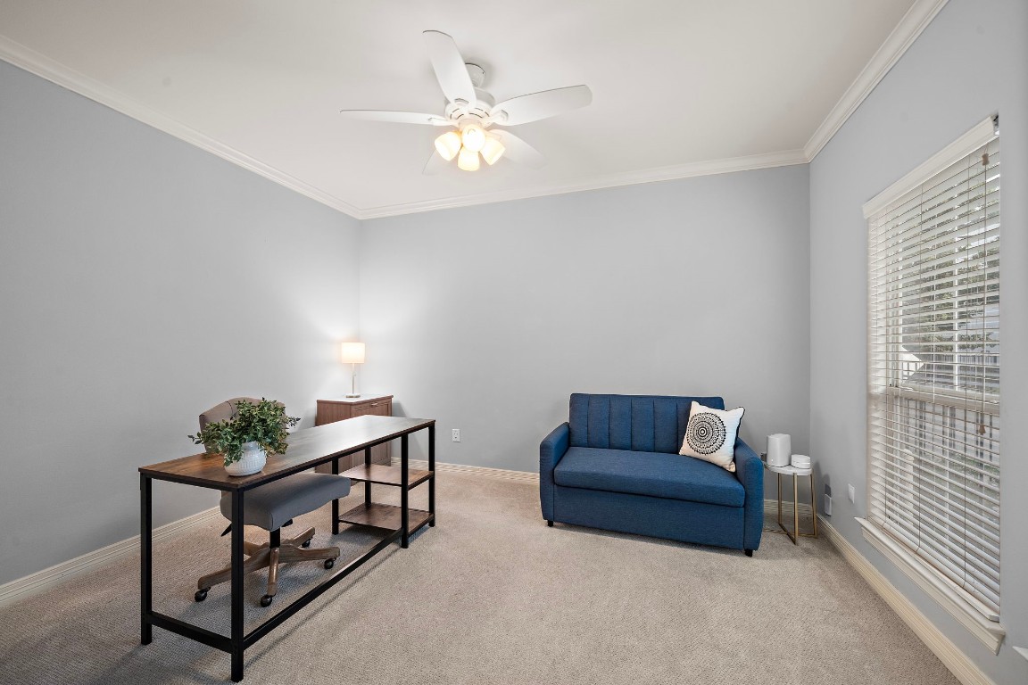3929 Floyd Street Houston, TX 77007 - Photo 9 of 42 Flexible secondary bedroom or home office offers plush carpeting, neutral wall tones, and a large picture window for abundant natural light.