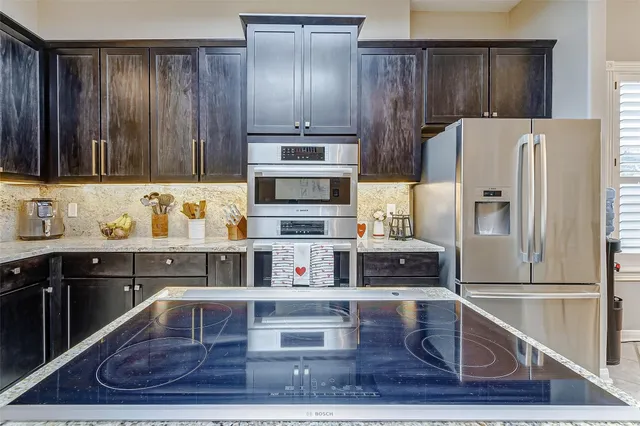 a view of a backyard with a garden and plants