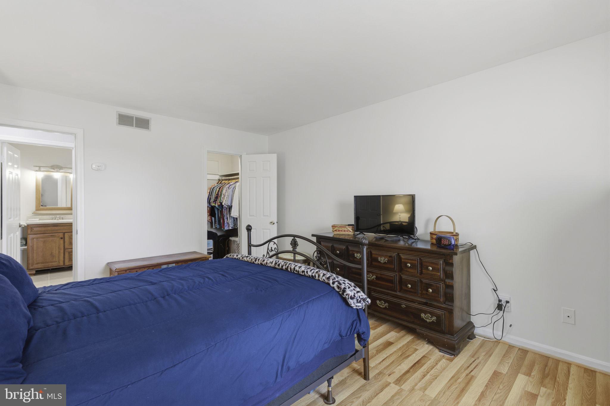 3831 Wilkinson Road Havre de Grace, MD 21078 - Photo 18 of 51 a bedroom with a bed and a television