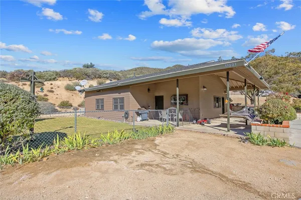 a view of a house with a outdoor space