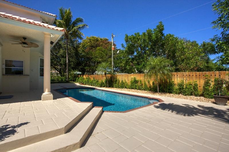 1311 Northwest 2nd Circle Boca Raton, FL 33432 - Photo 21 of 24 Backyard_With_Pool