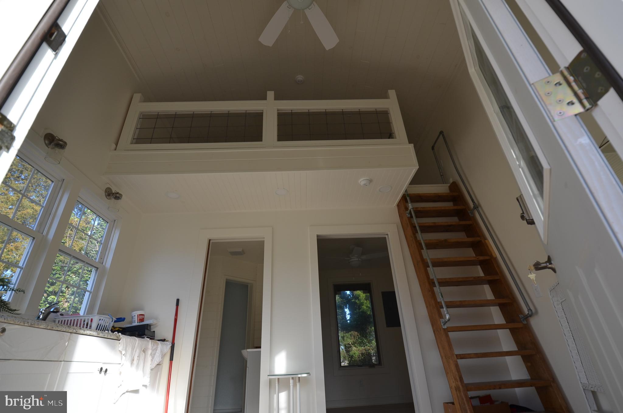 24697 Broadkill Road Milton, DE 19968 - Photo 5 of 10 a view of an entryway with a front door