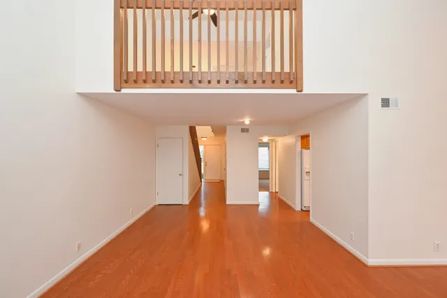 a bathroom with a shower a toilet and a sink