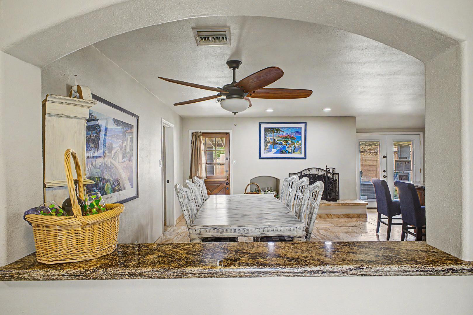 3346 East Cochise Road Phoenix, AZ 85028 - Photo 10 of 40 a living room with dining room and wooden floor