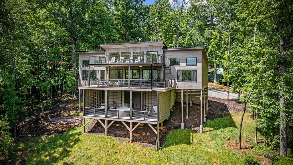 880 Little Bushy Head Road Blue Ridge, GA 30513 - Photo 1 of 51 a view of a house with a roof deck