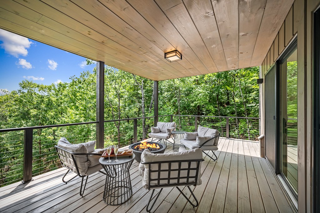 880 Little Bushy Head Road Blue Ridge, GA 30513 - Photo 30 of 51 a view of a patio on the deck