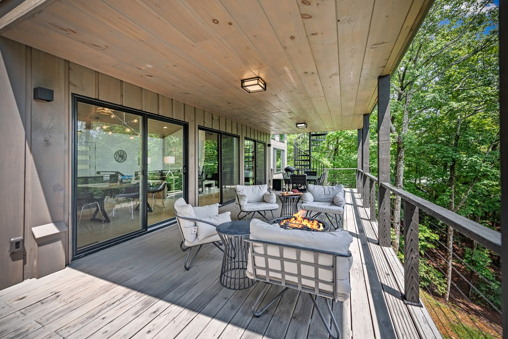 880 Little Bushy Head Road Blue Ridge, GA 30513 - Photo 32 of 51 a outdoor living space with furniture and garden view
