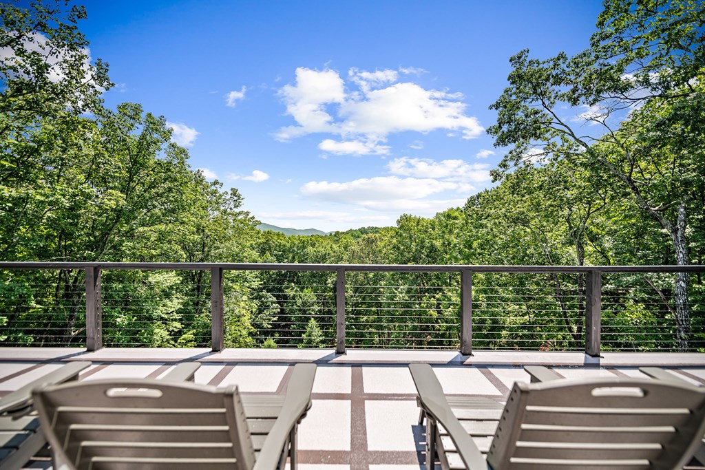 880 Little Bushy Head Road Blue Ridge, GA 30513 - Photo 38 of 51 a view of a balcony with mountain view and sitting space