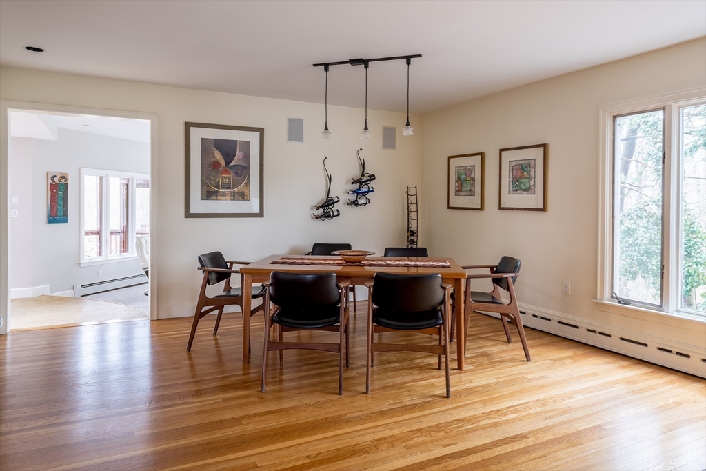 56 Varick Road Newton, MA 02468 - Photo 3 of 21 a view of a dining room with furniture and wooden floor