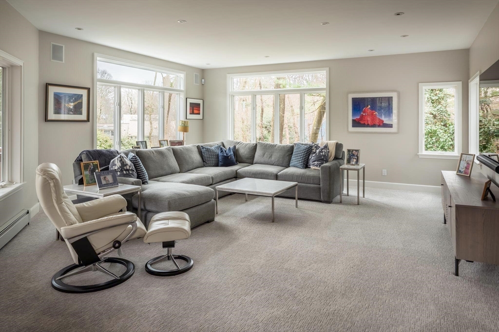 56 Varick Road Newton, MA 02468 - Photo 4 of 21 a living room with furniture and a window