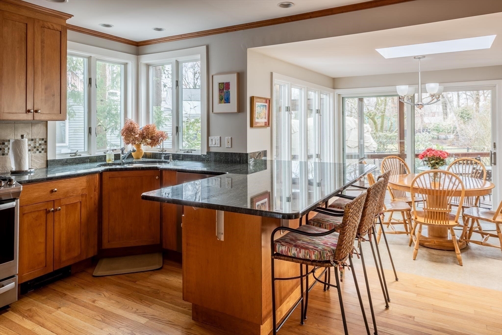 56 Varick Road Newton, MA 02468 - Photo 5 of 21 a very nice looking kitchen with furniture and wooden floor