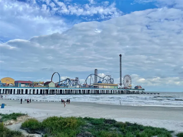 a view of a street with a building in the background