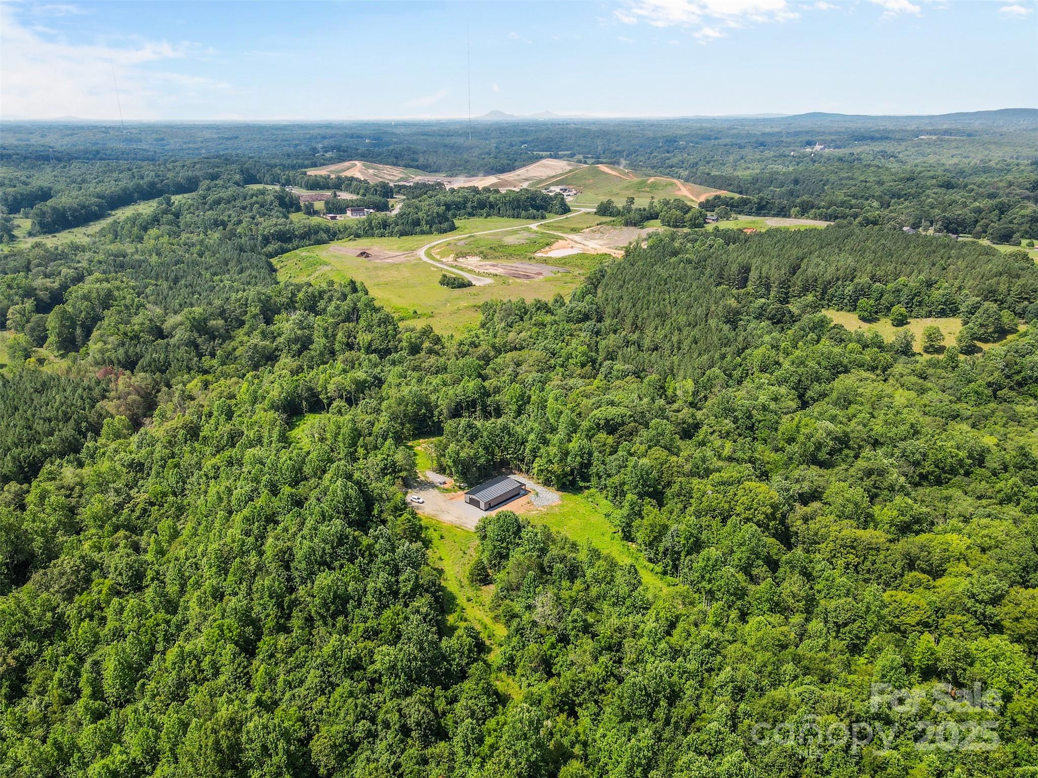 1371 Alexis High Shoals Road Dallas, NC 28034 - Photo 17 of 19 an aerial view of residential houses with outdoor space and trees