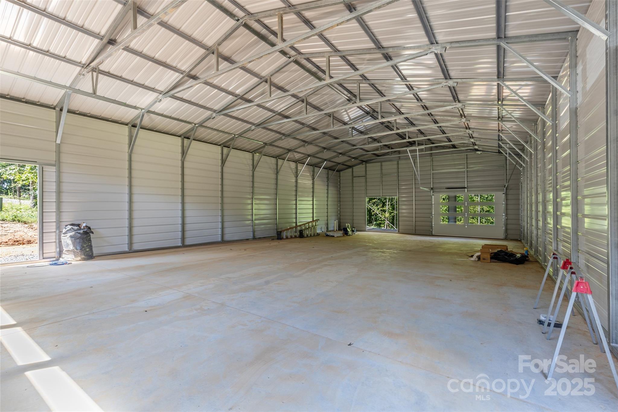 1371 Alexis High Shoals Road Dallas, NC 28034 - Photo 4 of 19 a view of an empty room with a garage