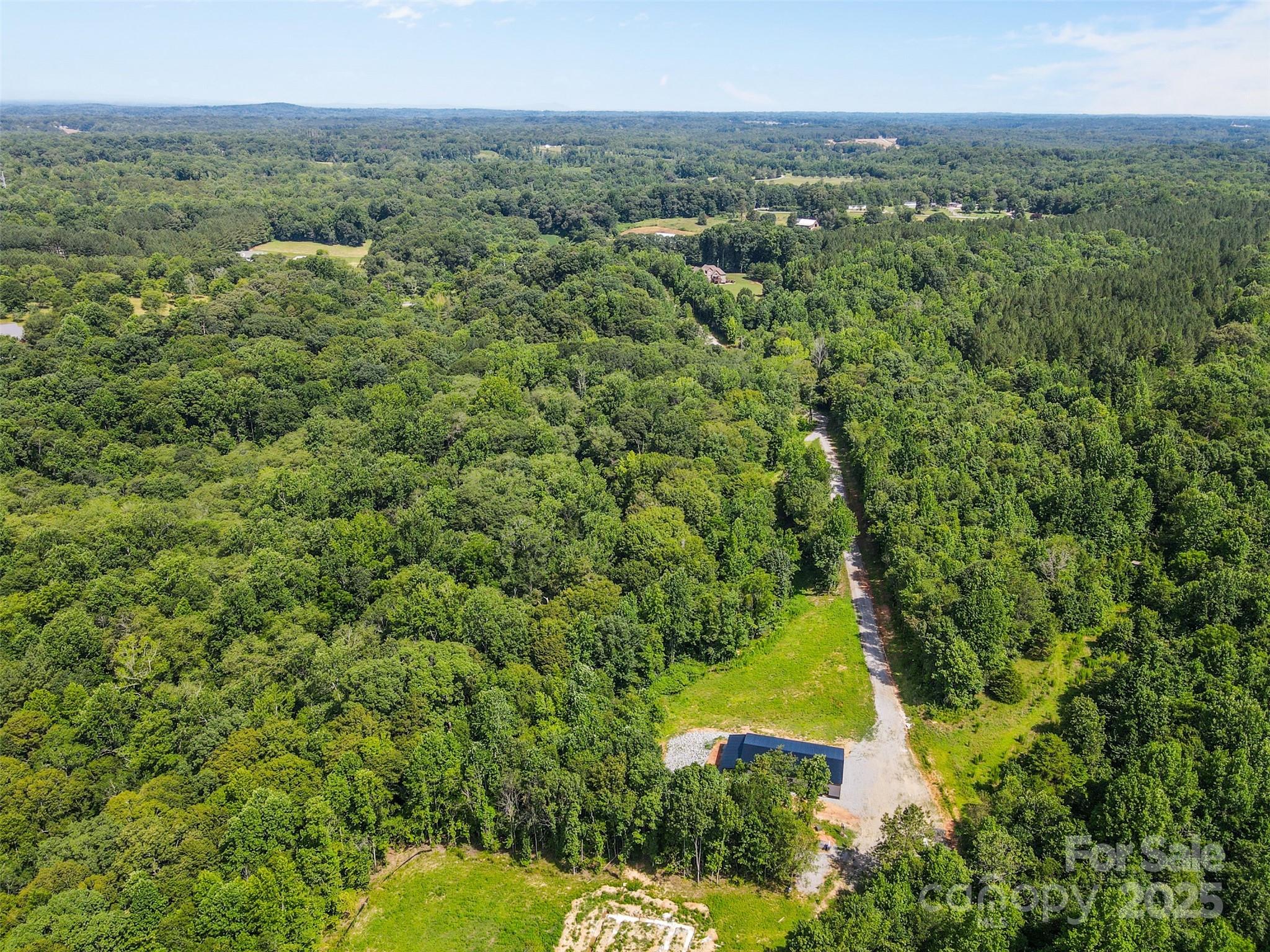 1371 Alexis High Shoals Road Dallas, NC 28034 - Photo 9 of 19 a view of a lake with a city