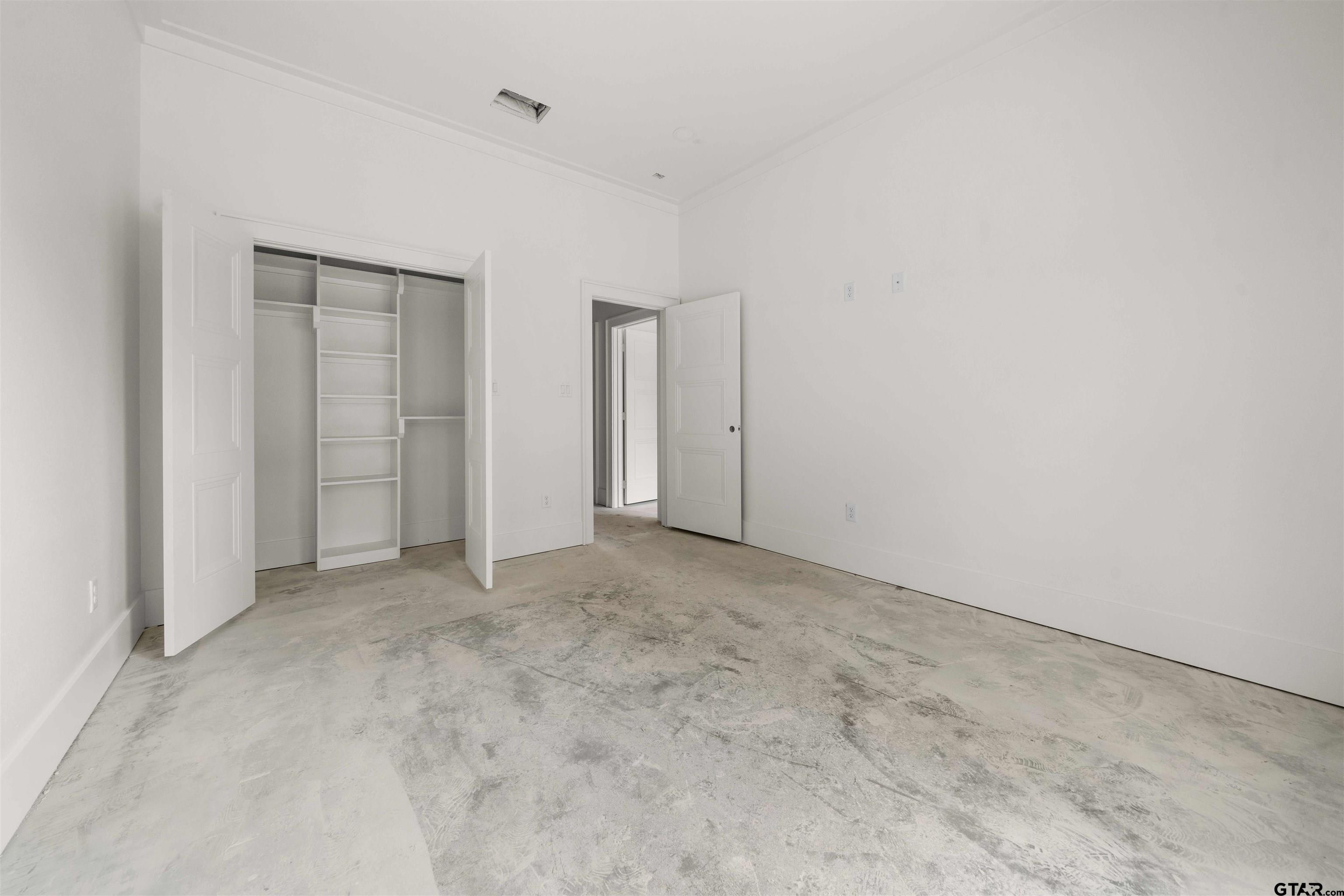 15050 7 League Road Tyler, TX 75703 - Photo 18 of 35 an empty room with closet area