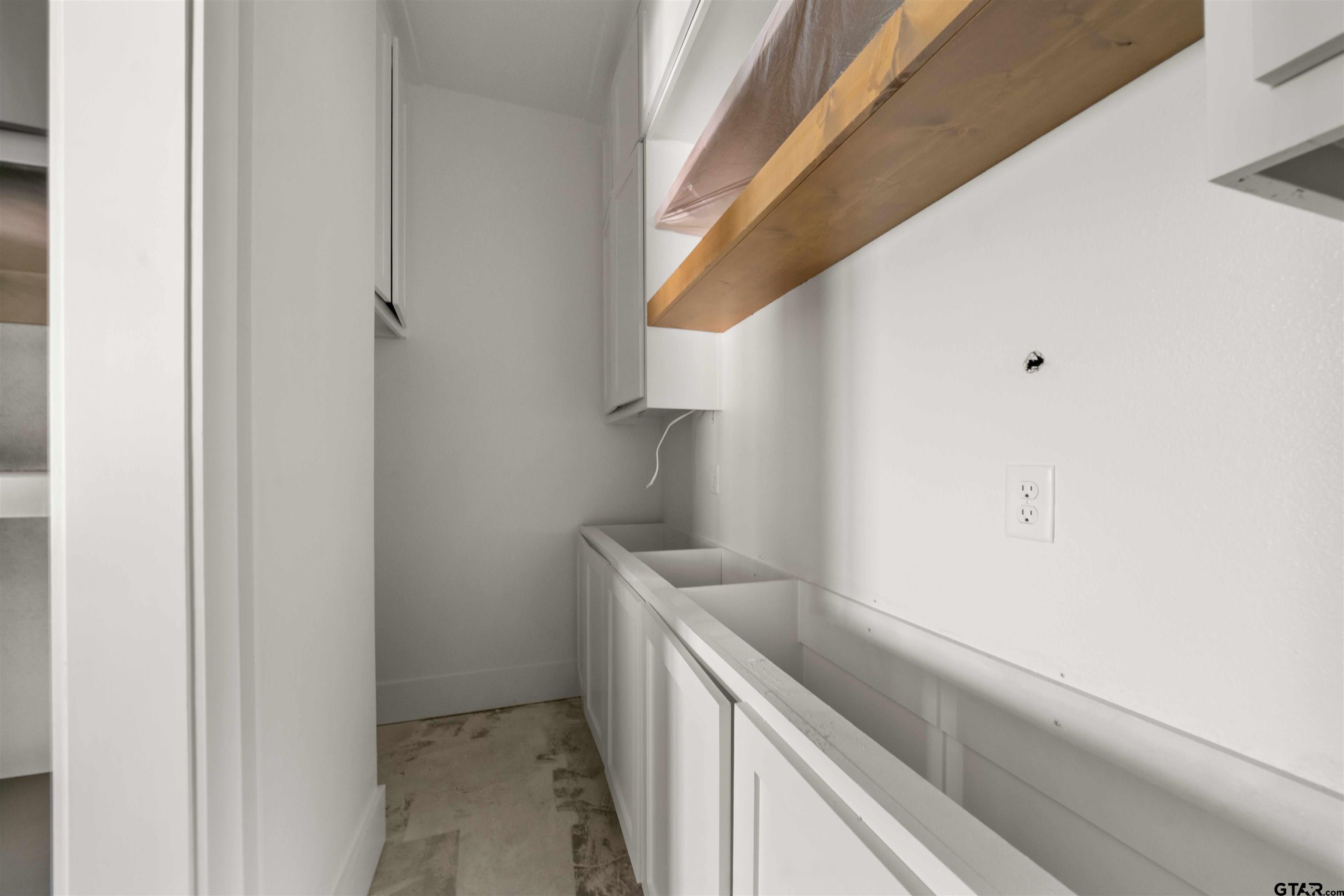15050 7 League Road Tyler, TX 75703 - Photo 27 of 35 a view of storage and utility room