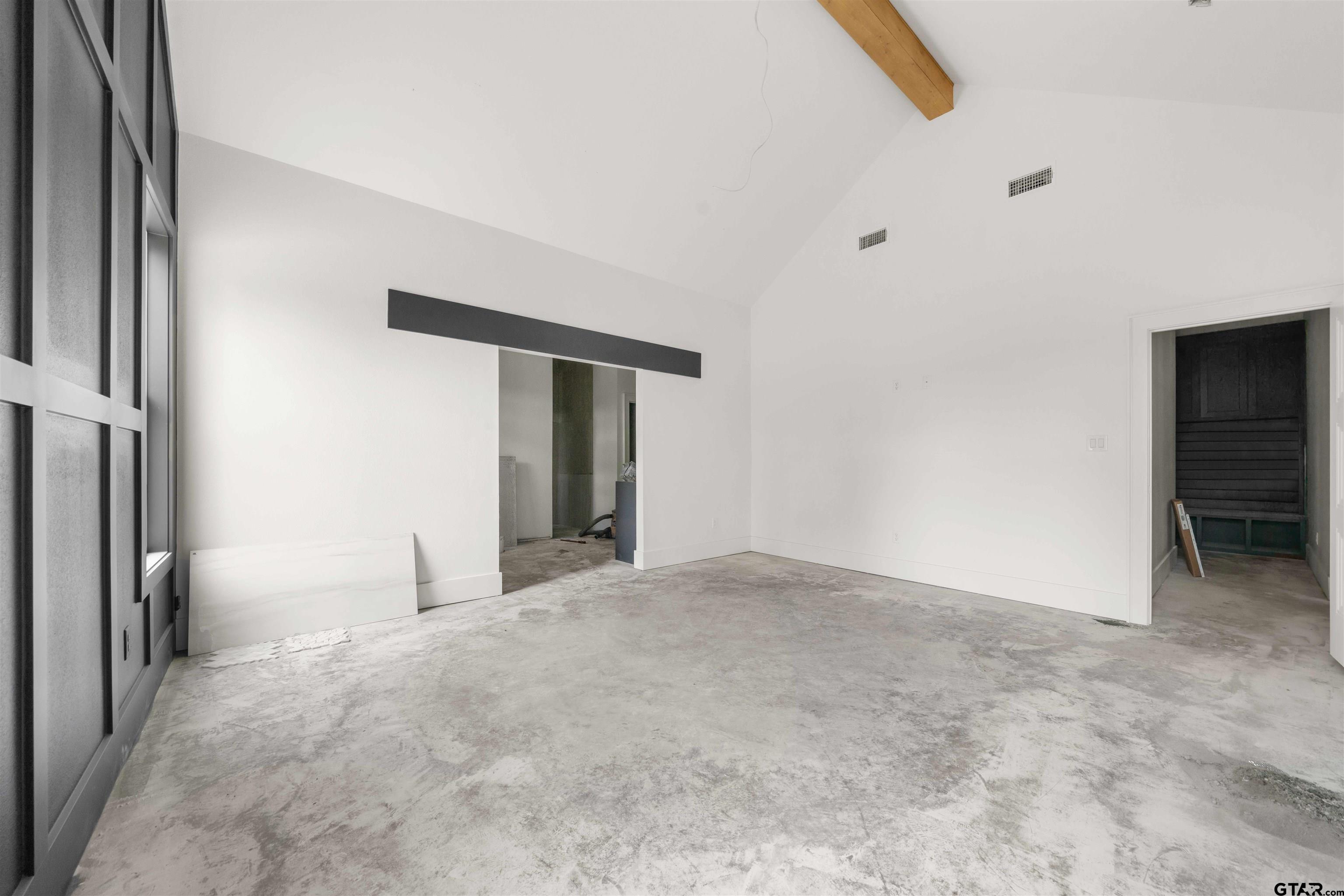 15050 7 League Road Tyler, TX 75703 - Photo 30 of 35 a view of an empty room with an entryway