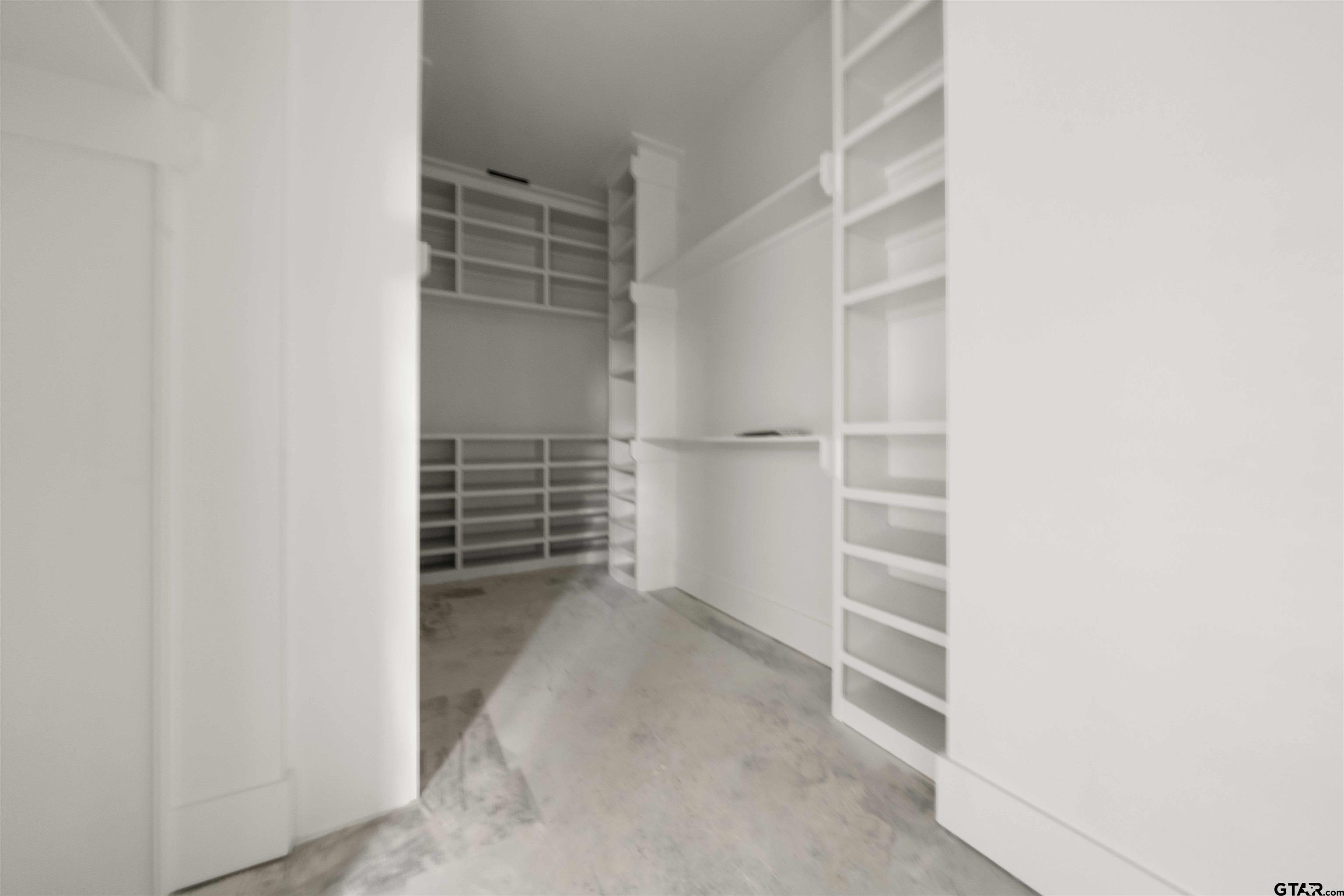 15050 7 League Road Tyler, TX 75703 - Photo 31 of 35 a view of an empty walk in closet