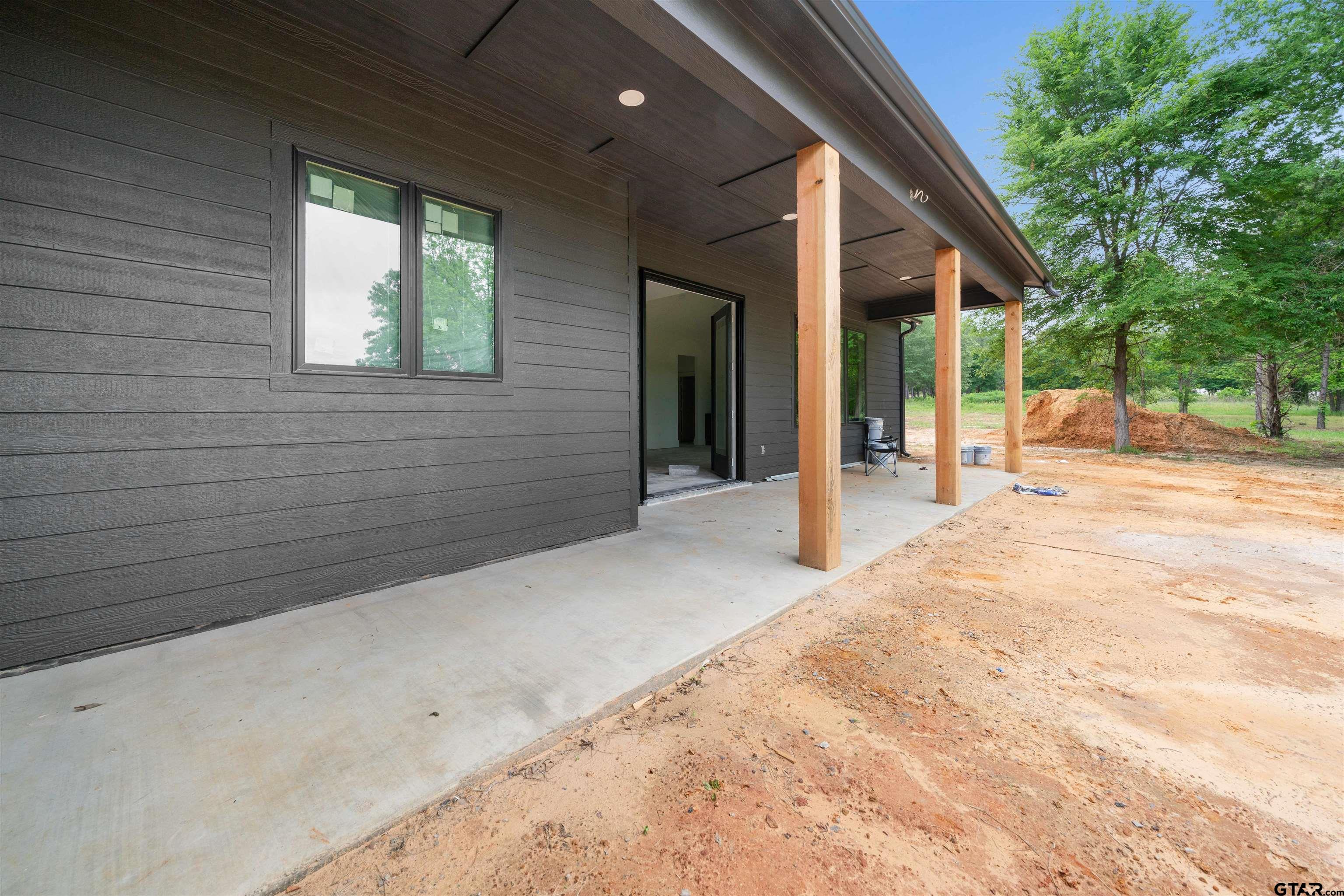 15050 7 League Road Tyler, TX 75703 - Photo 34 of 35 a view of livingroom with an outdoor space