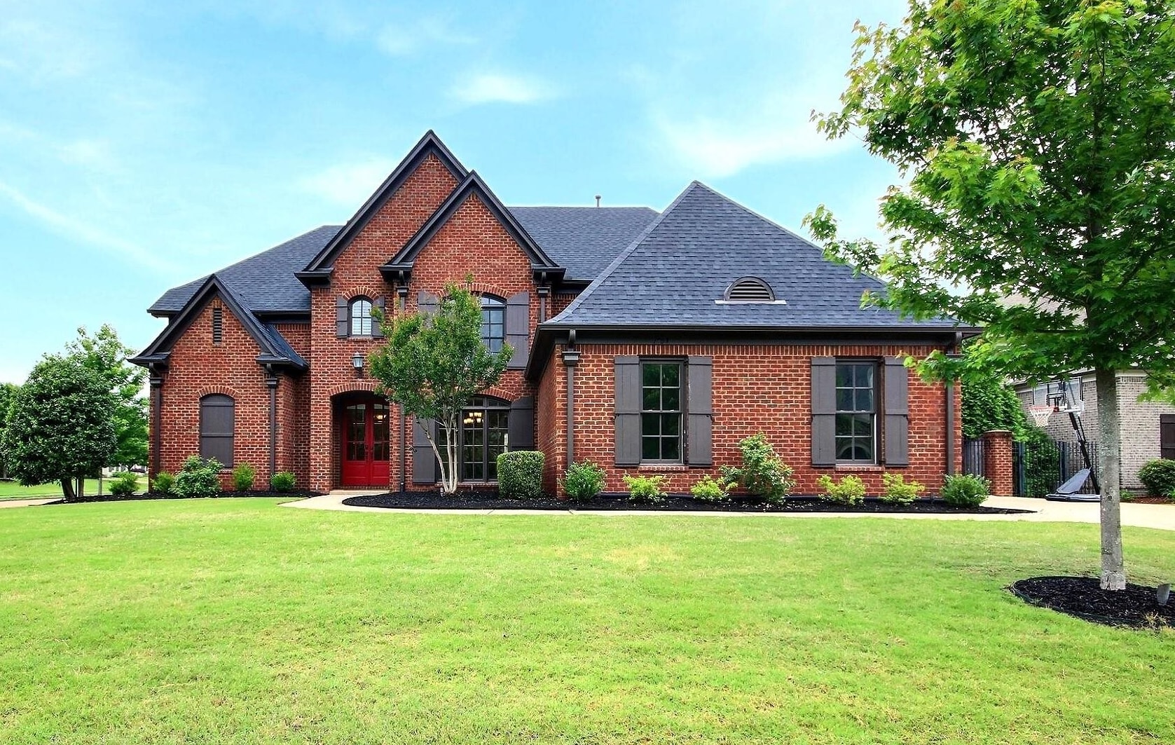 1707 Totty Lane Collierville, TN 38017 - Photo 1 of 40 a front view of house with yard and green space