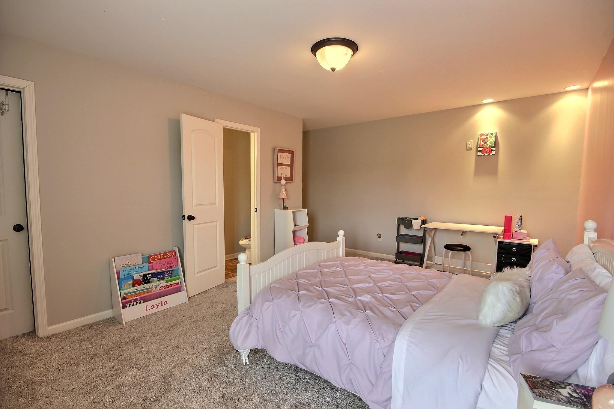 1707 Totty Lane Collierville, TN 38017 - Photo 26 of 40 a bedroom with a bed and a view of bedroom