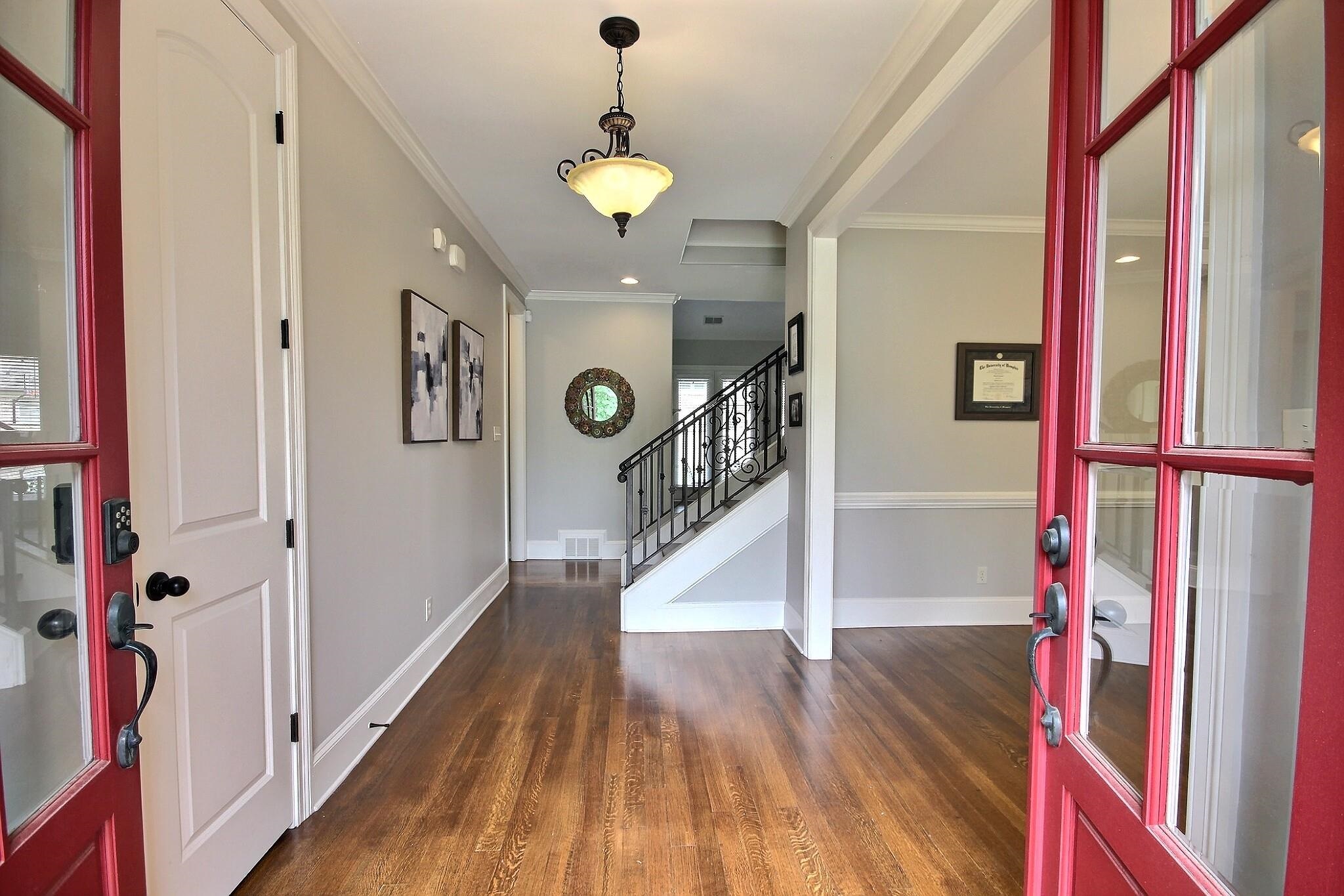 1707 Totty Lane Collierville, TN 38017 - Photo 4 of 40 a view of entryway with stairs and wooden floor