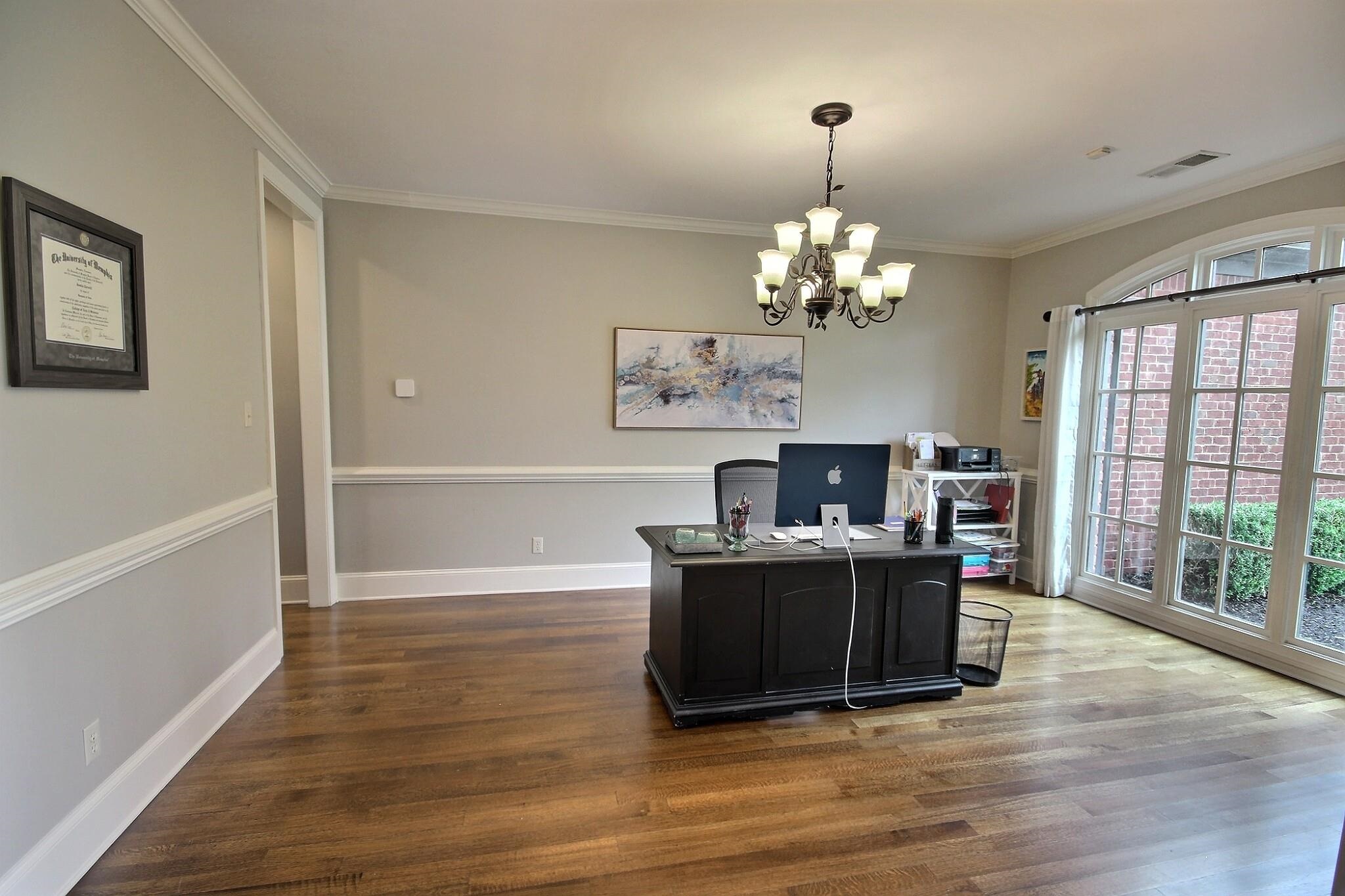 1707 Totty Lane Collierville, TN 38017 - Photo 5 of 40 a view of a livingroom with furniture window and wooden floor