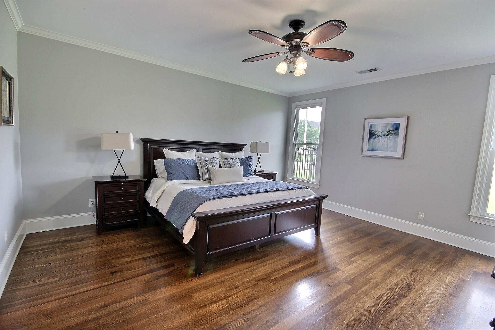 1707 Totty Lane Collierville, TN 38017 - Photo 7 of 40 a bedroom with a bed and a ceiling fan