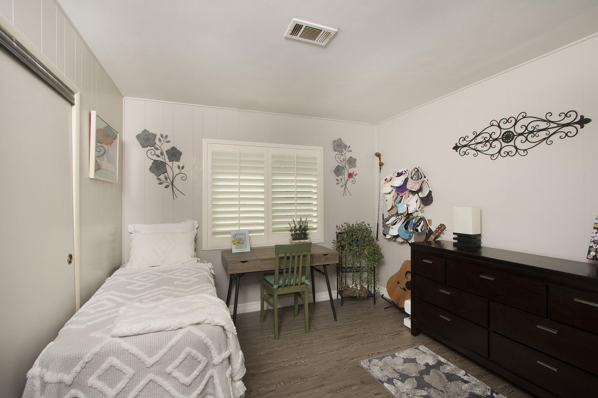 34649 Double Diamond Drive Thousand Palms, CA 92276 - Photo 16 of 42 a bed room with a bed and a couch