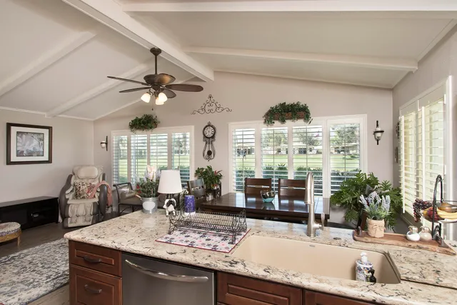 a view of a living room and dining room