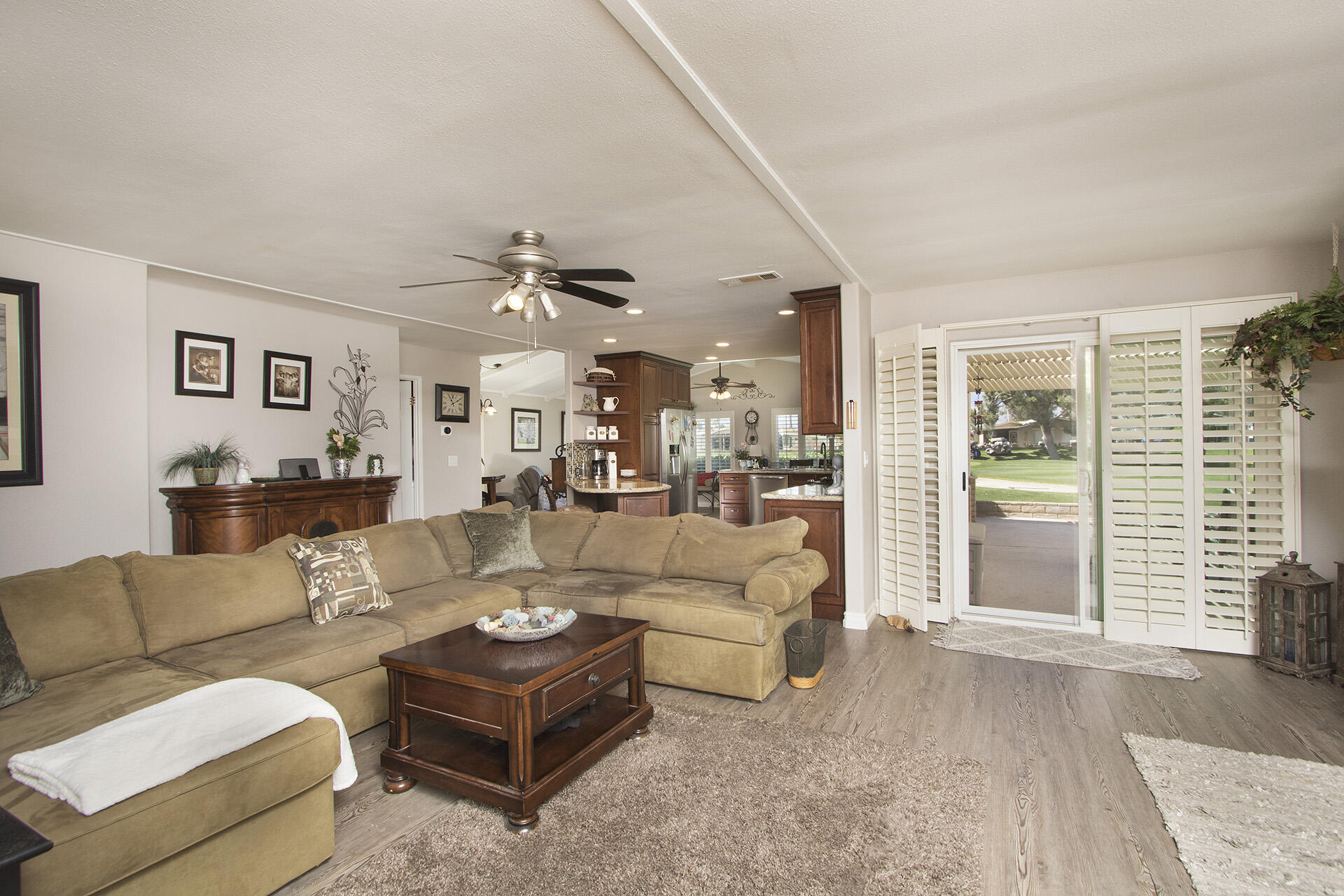 34649 Double Diamond Drive Thousand Palms, CA 92276 - Photo 29 of 42 a living room with furniture and a large window