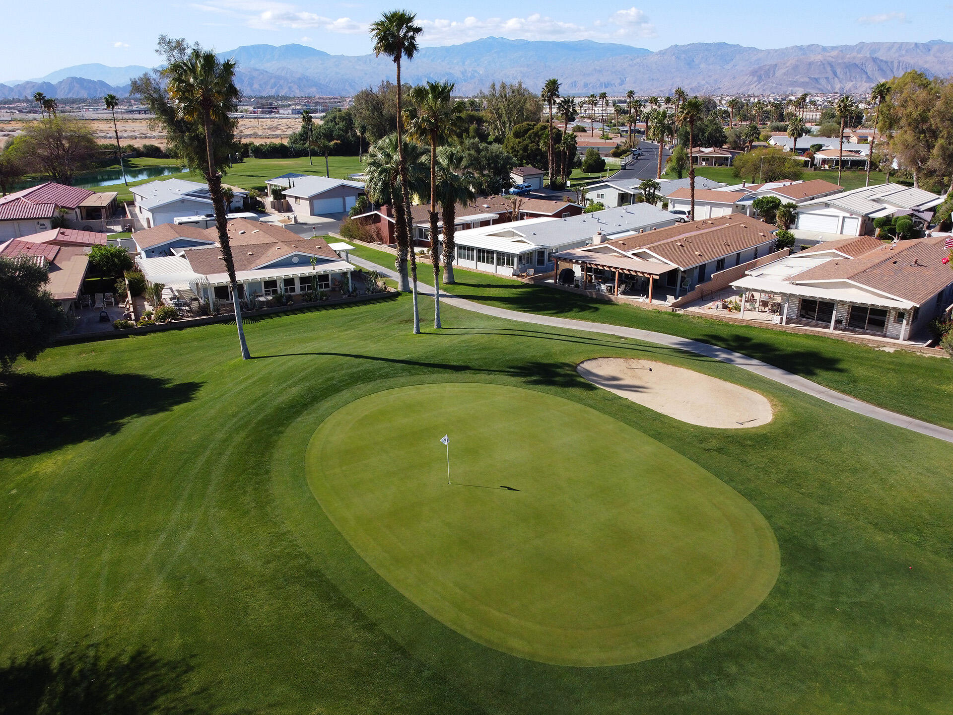 34649 Double Diamond Drive Thousand Palms, CA 92276 - Photo 41 of 42 an aerial view of residential houses with outdoor space and swimming pool
