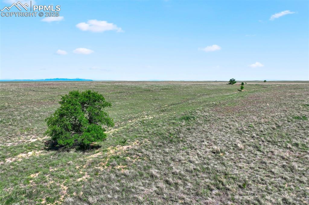 0 Service Ranch Point Yoder, CO 80864 - Photo 11 of 16 a view of a field with an ocean