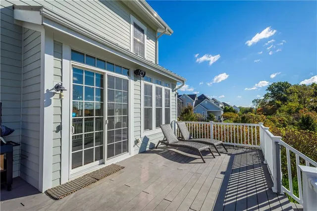 a view of a house with backyard and porch