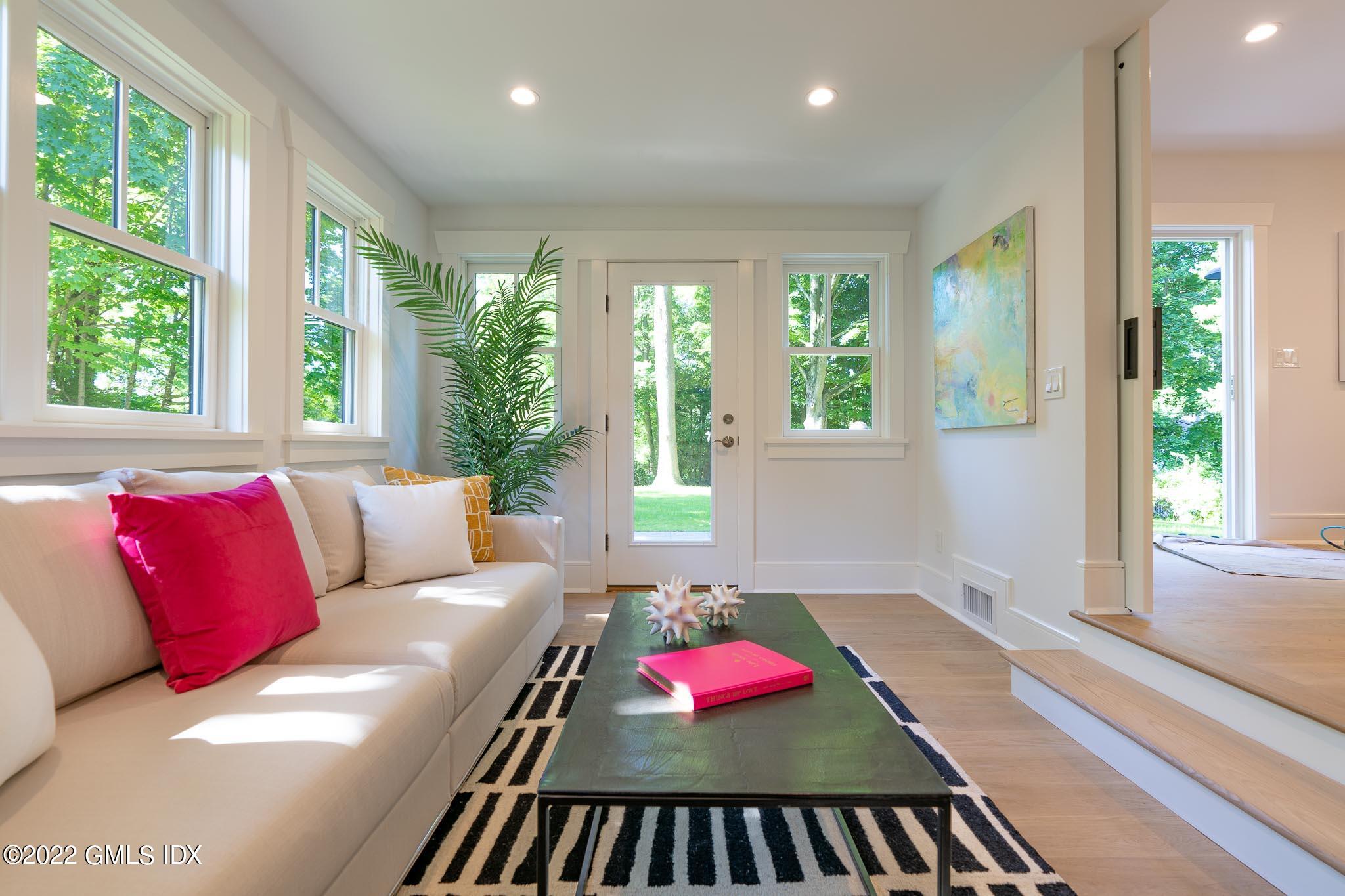 40 Halsey Drive Old Greenwich, CT 06870 - Photo 19 of 40 a living room with furniture and a large window
