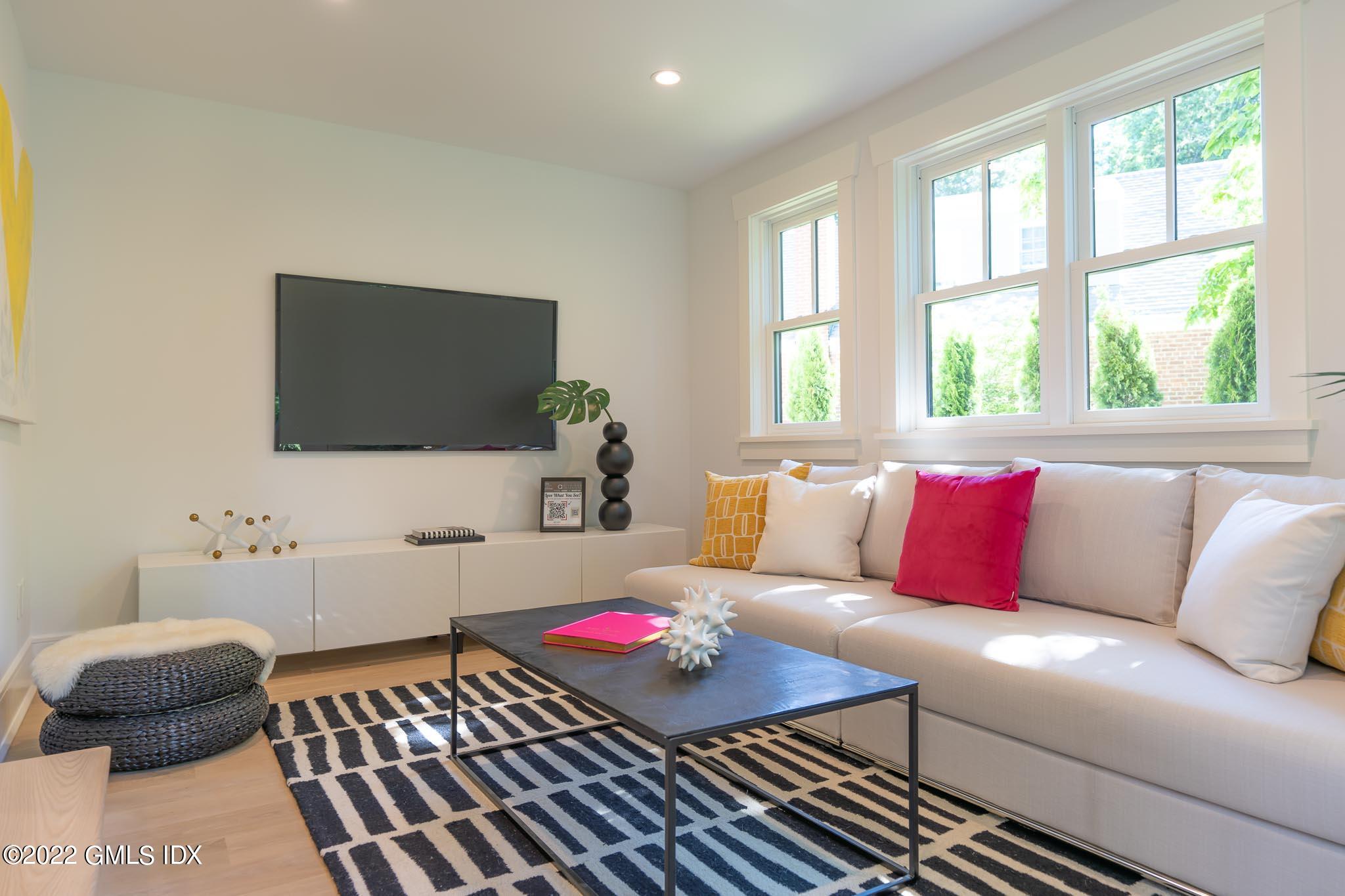 40 Halsey Drive Old Greenwich, CT 06870 - Photo 20 of 40 a living room with furniture and a flat screen tv