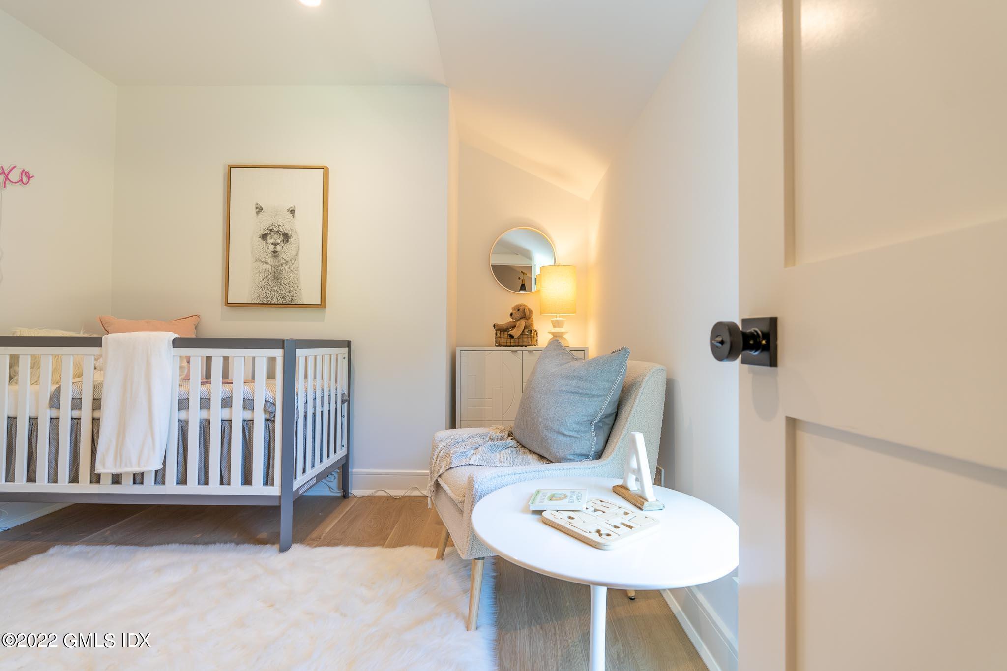 40 Halsey Drive Old Greenwich, CT 06870 - Photo 27 of 40 a bathroom with a sink and a mirror